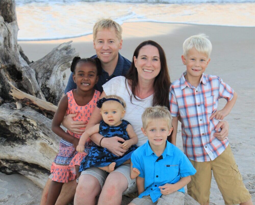 Dr. David W. Sorensen with his wife and their four children on the beach