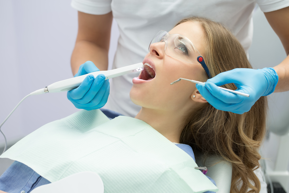 Patient receiving a dental examination